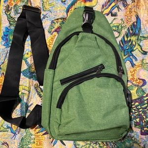 Sling backpack with USB port